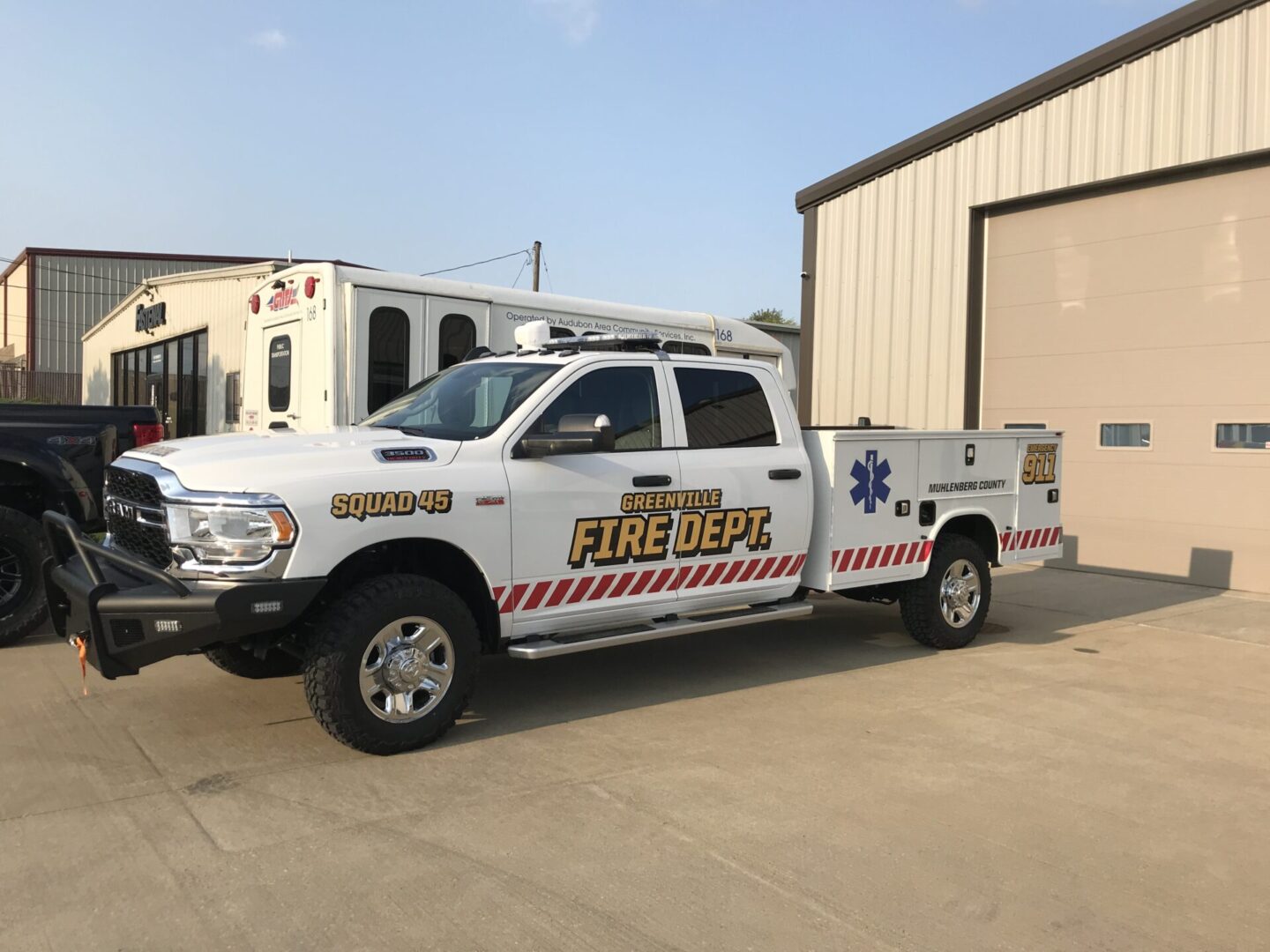 A white truck with the words 