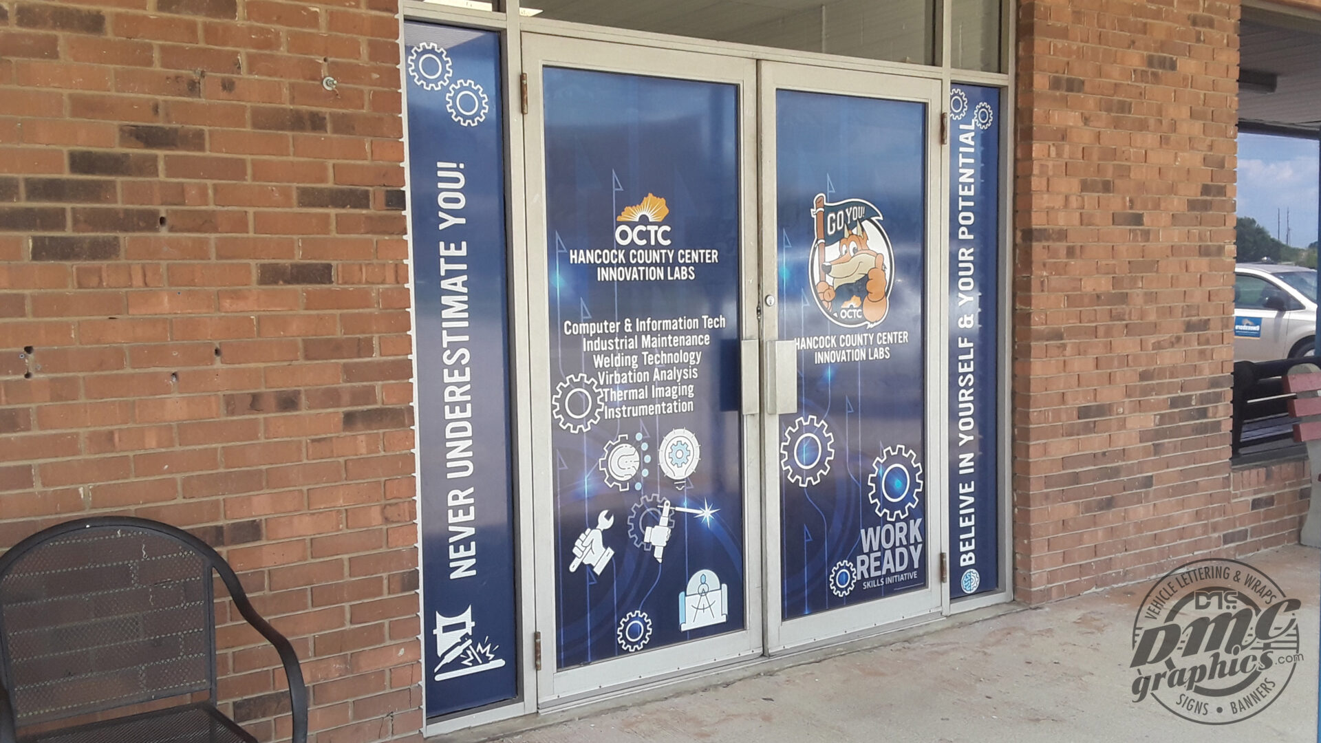 A large glass door with windows and stickers on it.