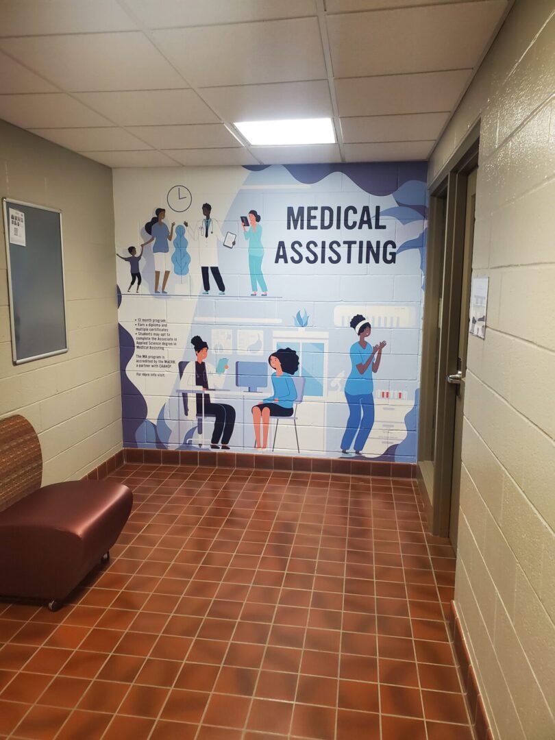 A room with a wall mural of medical assistants.