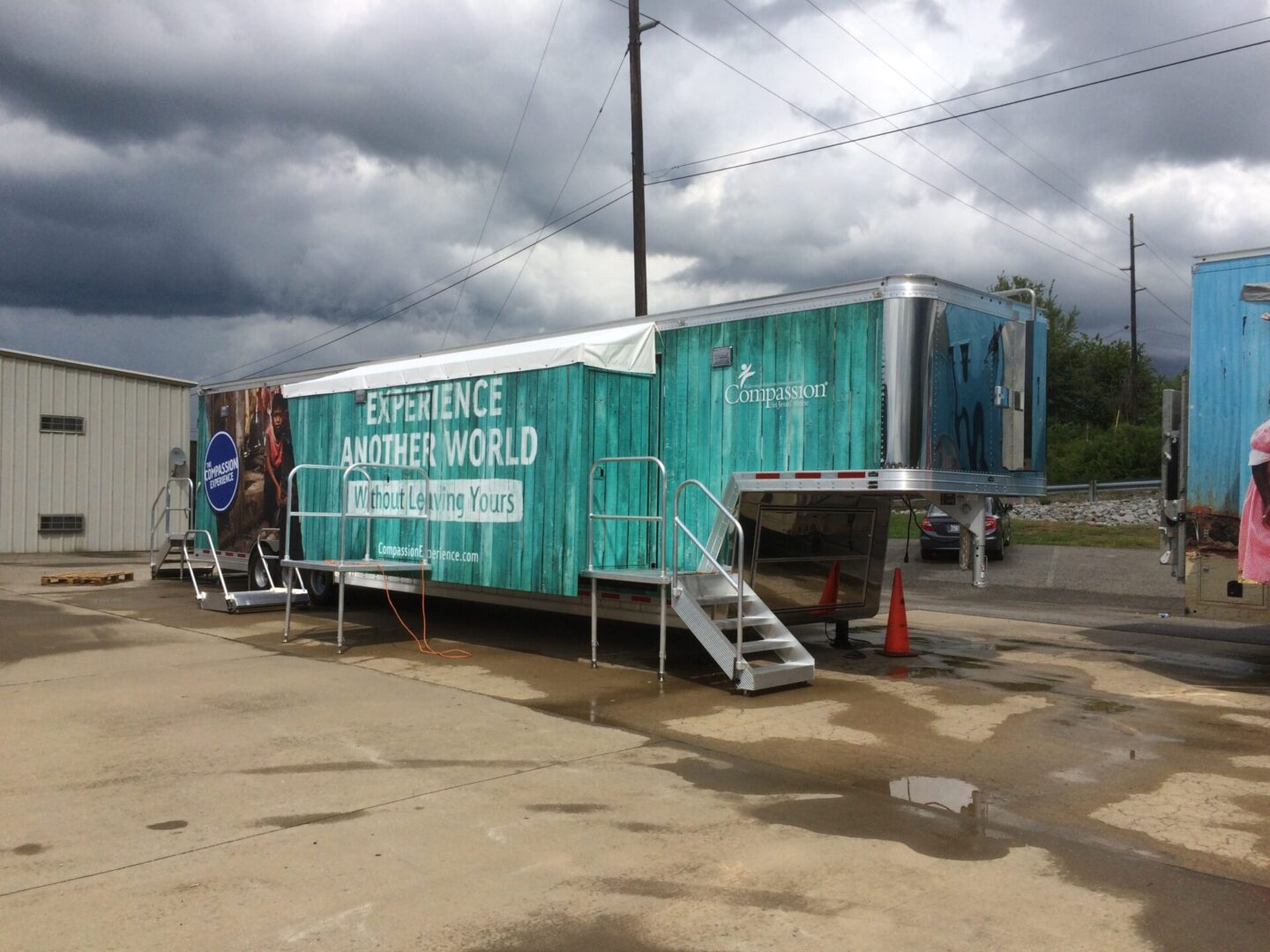 A large trailer with steps leading to it.