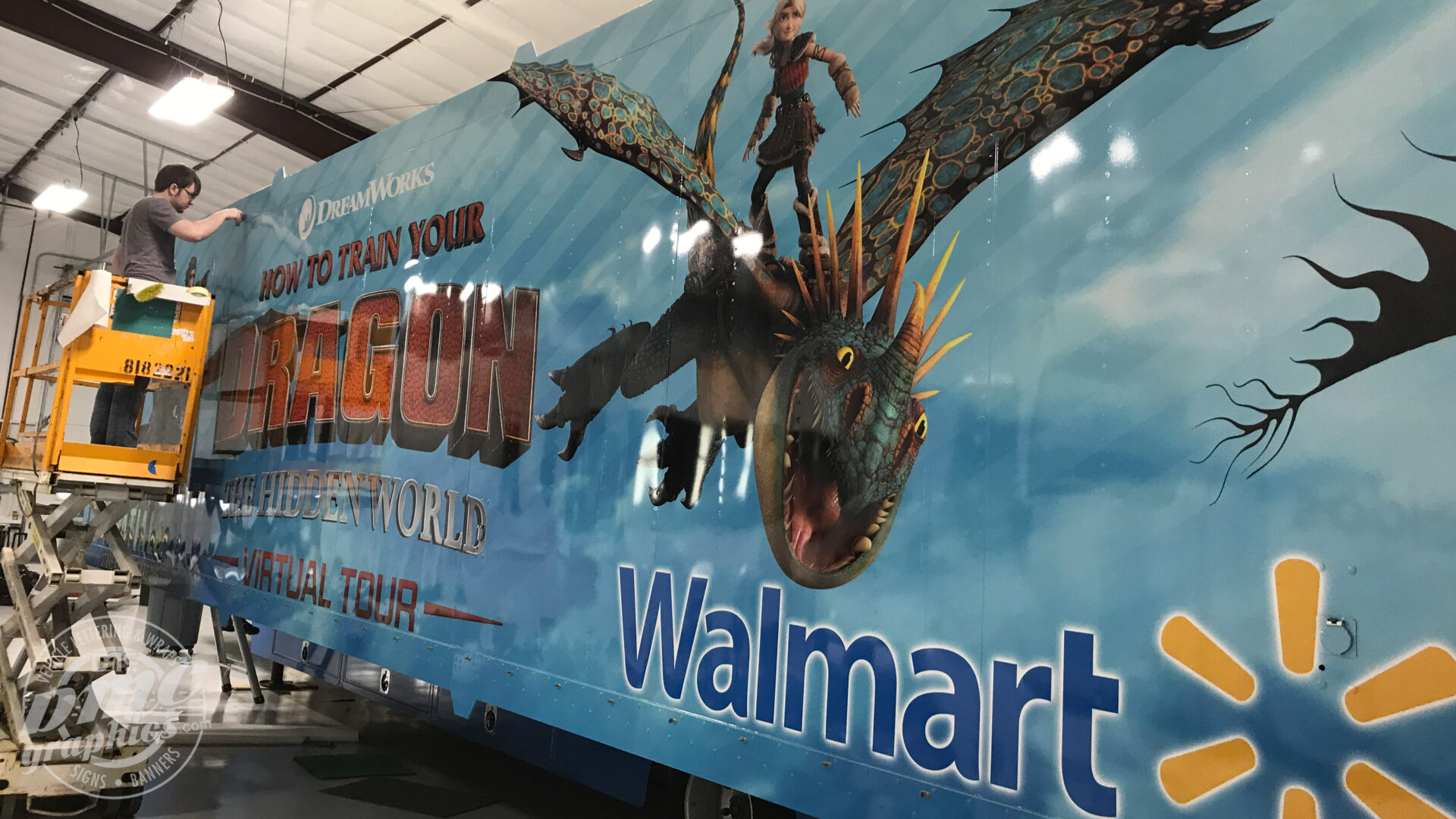 A large sign for how to train your dragon walmart.