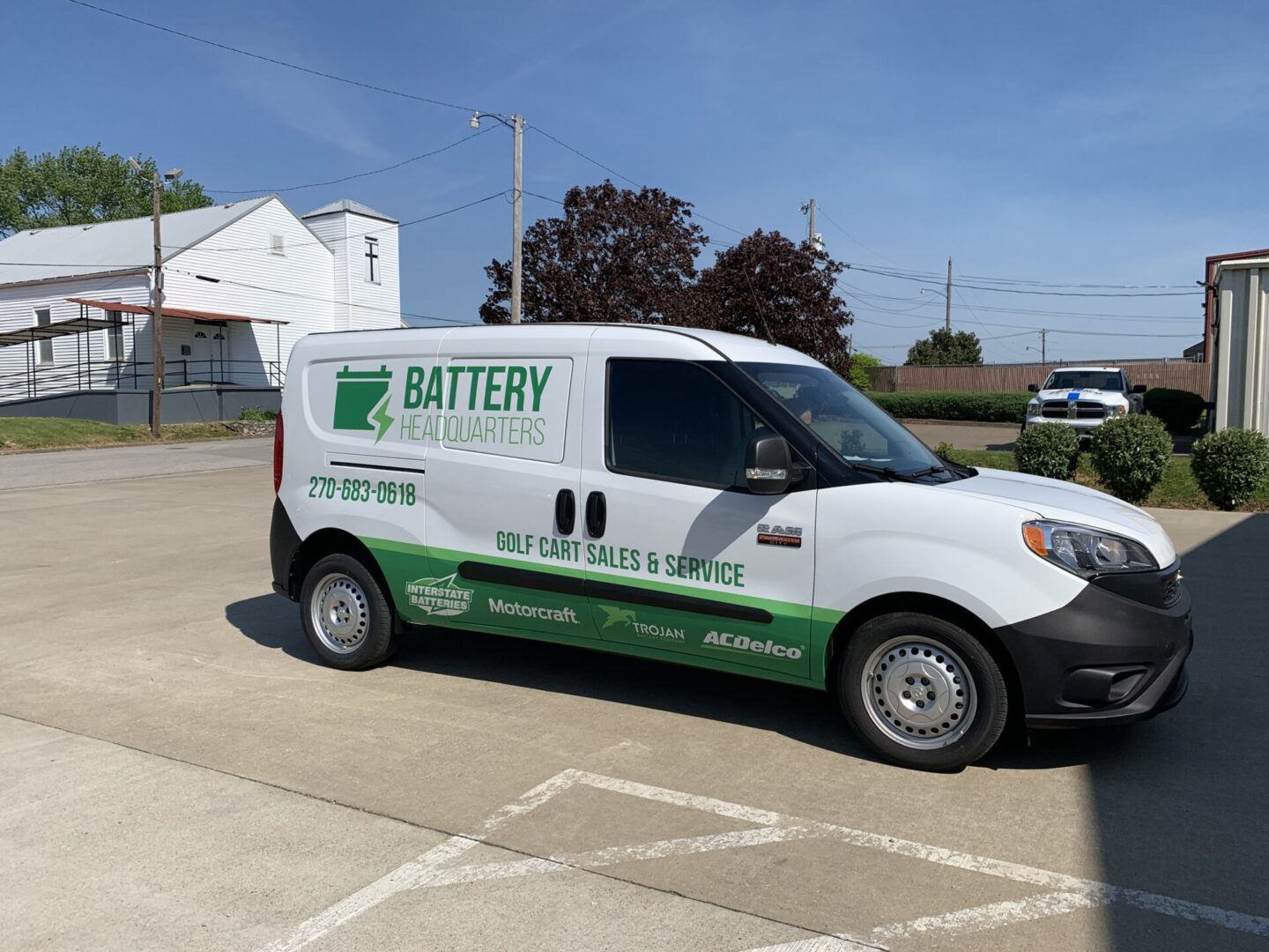 A van with the company logo on it.