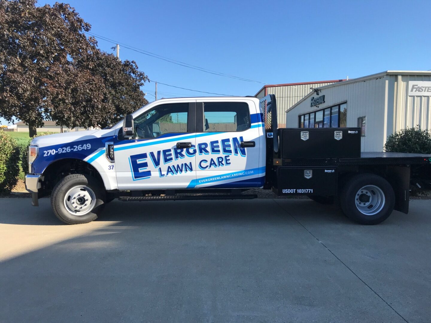 A truck with the company 's logo on it.