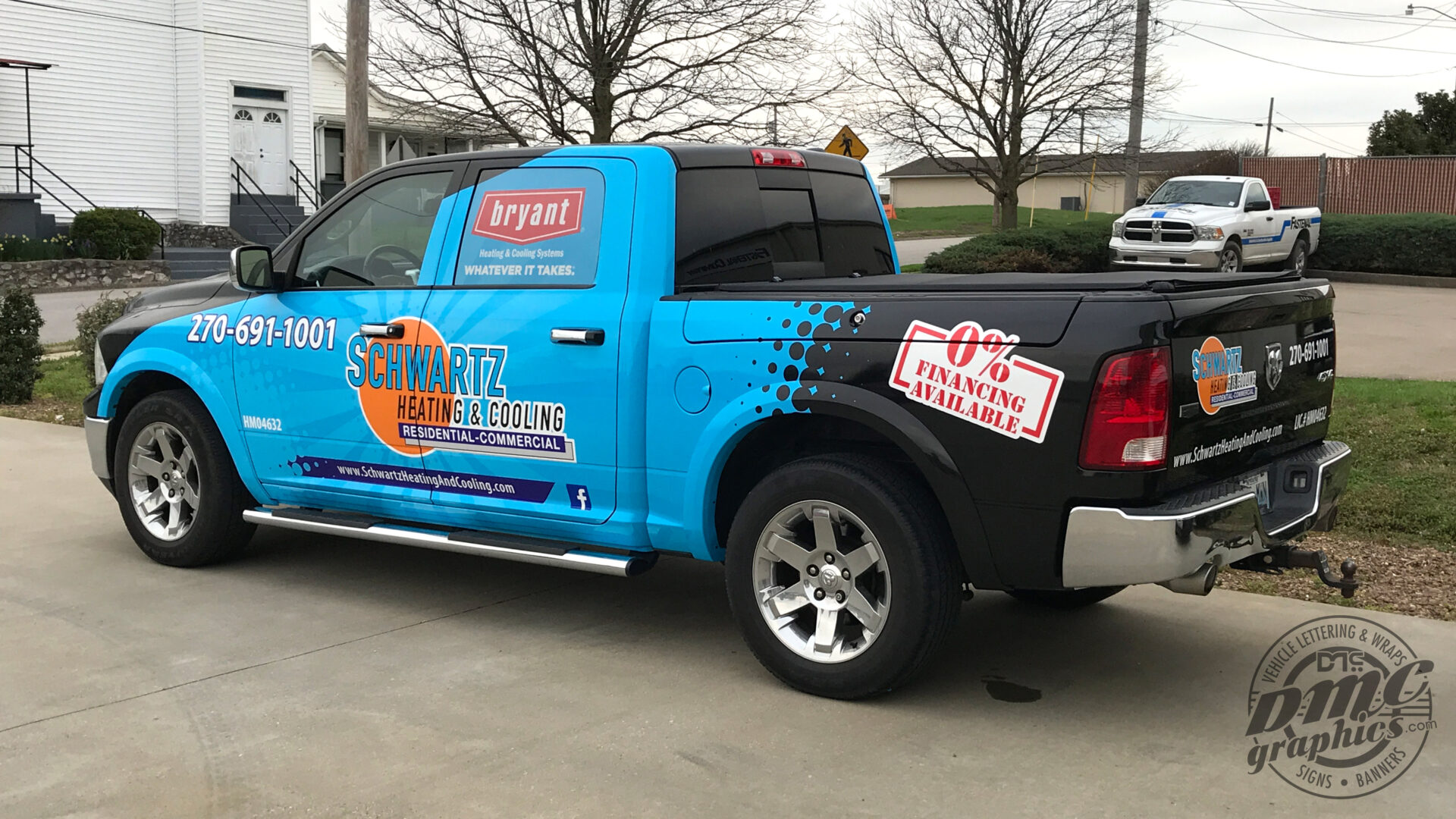 A truck with advertising on the side of it.