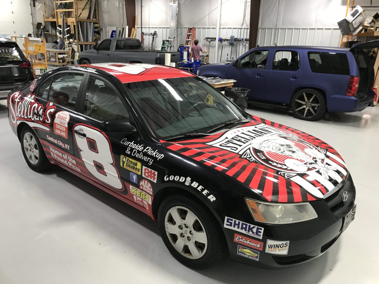 A car that is parked in a garage.