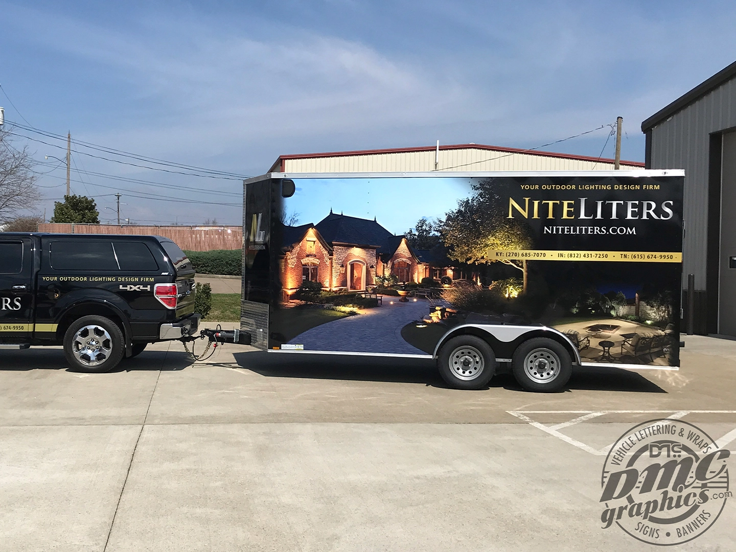 A trailer with a large picture of a house on it.